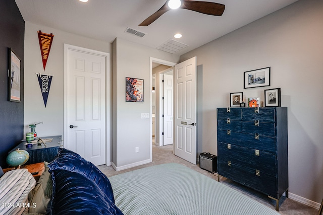 carpeted bedroom with ceiling fan