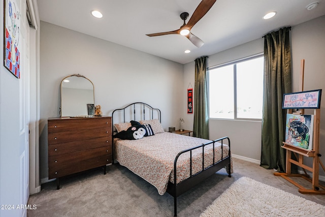 carpeted bedroom with ceiling fan