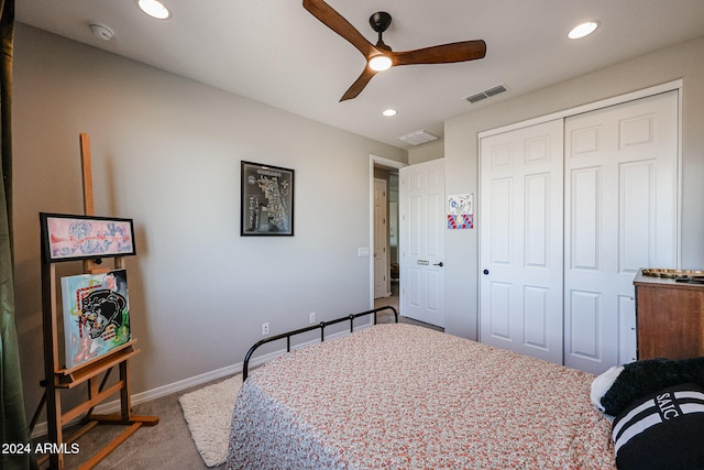 bedroom with a closet, ceiling fan, and carpet