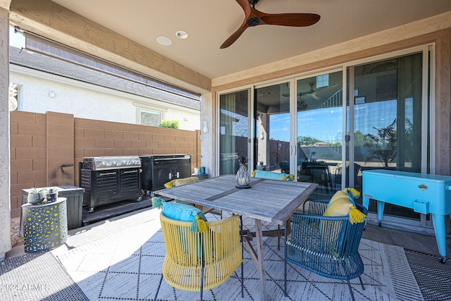 view of patio featuring ceiling fan