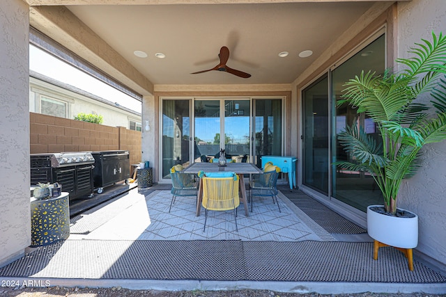 view of patio / terrace featuring ceiling fan