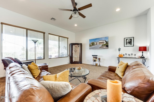 living room with carpet flooring and ceiling fan