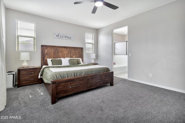 bedroom featuring carpet floors, ensuite bathroom, baseboards, and a ceiling fan