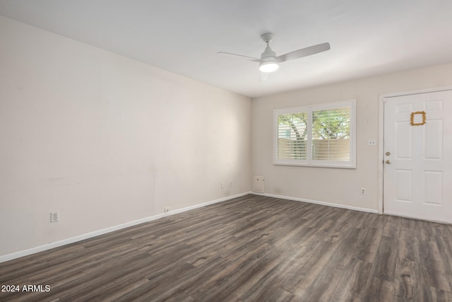 foyer with dark hardwood / wood-style floors and ceiling fan