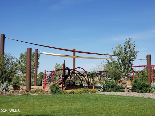 community playground featuring a lawn