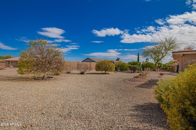 view of yard featuring fence