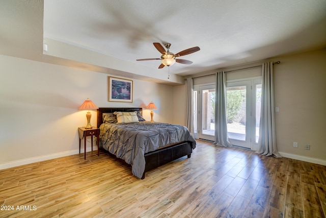 bedroom with access to outside, light hardwood / wood-style floors, and ceiling fan