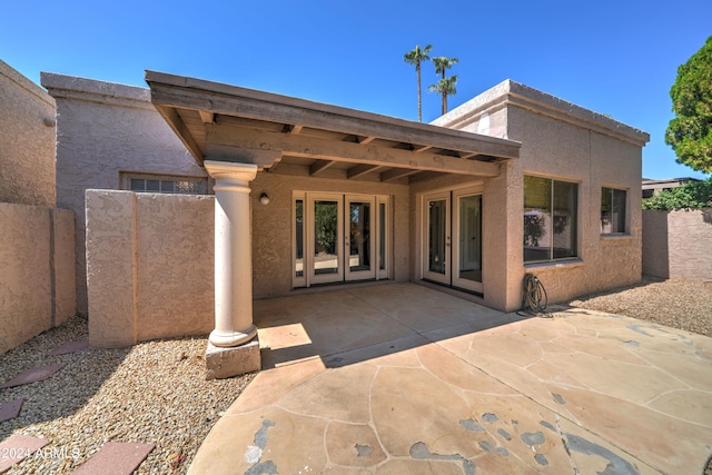 rear view of house featuring a patio