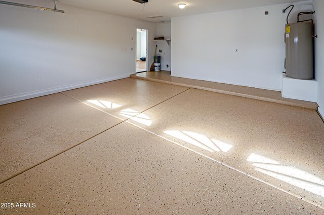 garage featuring electric water heater