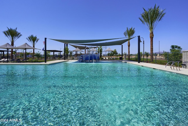 view of pool featuring pool water feature