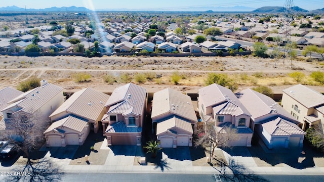 drone / aerial view with a mountain view and a residential view