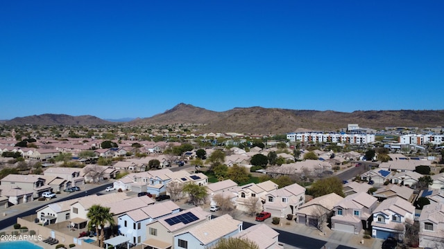 birds eye view of property featuring a residential view and a mountain view