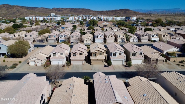 bird's eye view featuring a residential view and a mountain view