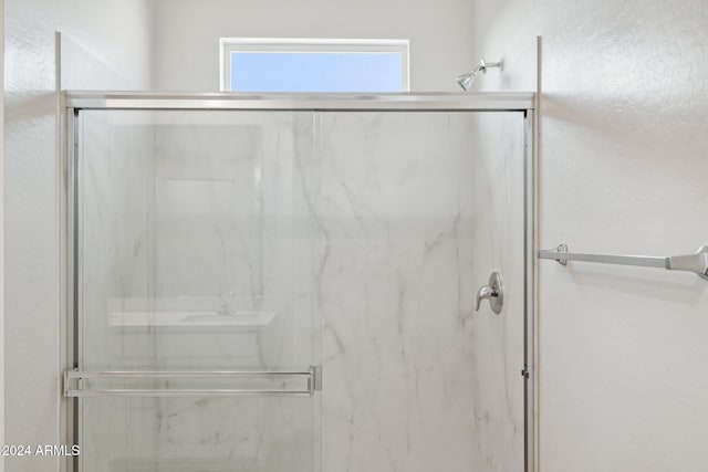 25484 W Graham Trl, Buckeye, AZ 85326 - bathroom with a marble finish shower