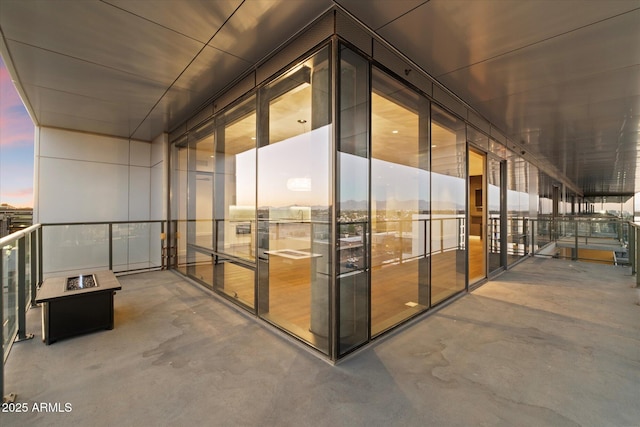 exterior space featuring an outdoor fire pit