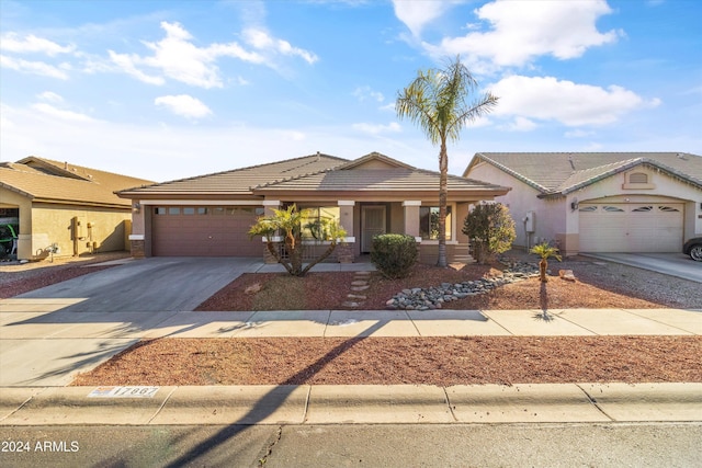 view of front of property featuring a garage