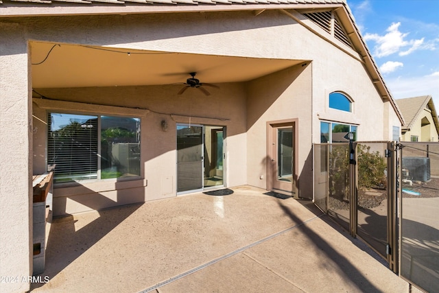 exterior space with a patio area and ceiling fan