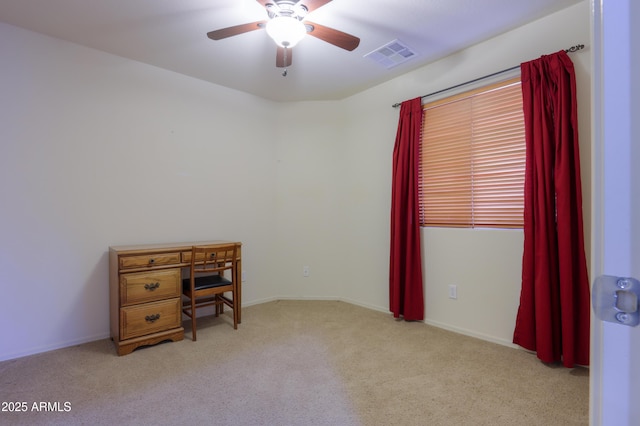 interior space with ceiling fan