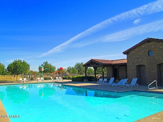 view of pool with a gazebo and a patio area