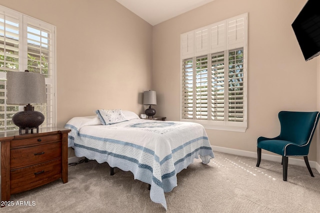 5226 S Fairchild Ln, Chandler, AZ 85249 - carpeted bedroom featuring multiple windows, baseboards, and vaulted ceiling