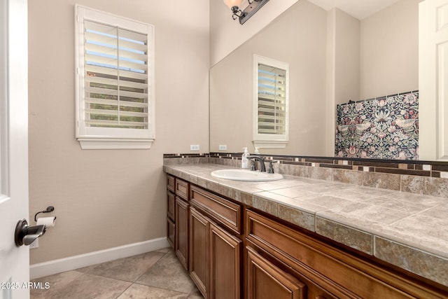 5226 S Fairchild Ln, Chandler, AZ 85249 - full bathroom with vanity, baseboards, and tile patterned flooring