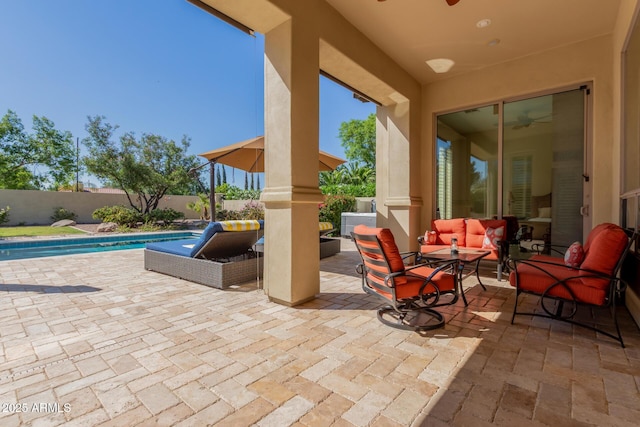 5226 S Fairchild Ln, Chandler, AZ 85249 - view of patio with an outdoor living space and a fenced backyard