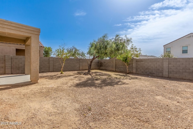 view of yard featuring a fenced backyard