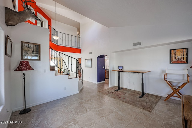 interior space featuring high vaulted ceiling