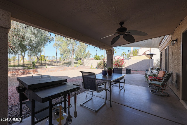 view of patio with ceiling fan