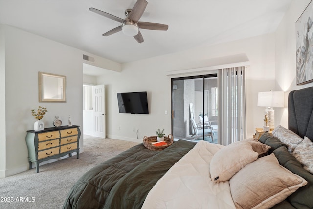 carpeted bedroom featuring access to exterior and ceiling fan