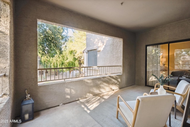 view of patio with a balcony