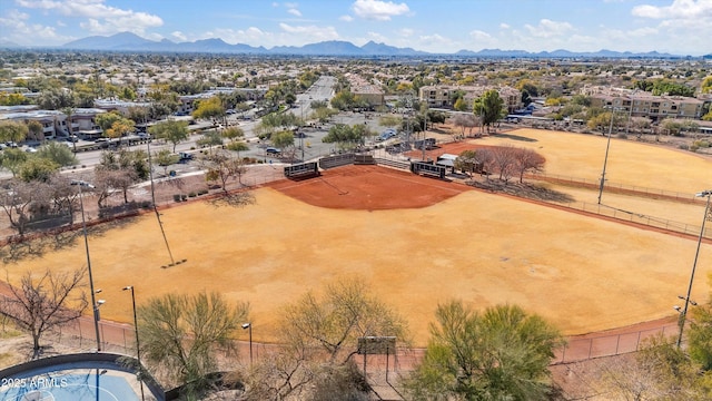 birds eye view of property featuring a mountain view