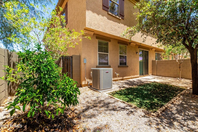 1250 S Rialto Unit 78, Mesa, AZ 85209 - rear view of house featuring stucco siding, a fenced backyard, and a patio area