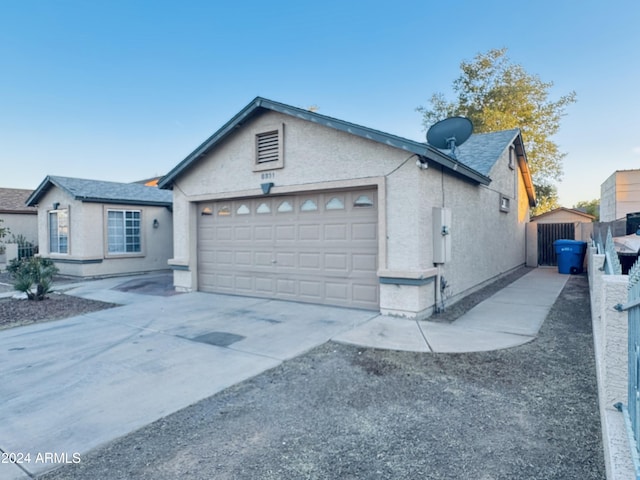 ranch-style house with a garage