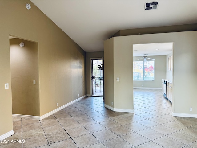 tiled entrance foyer featuring vaulted ceiling and ceiling fan