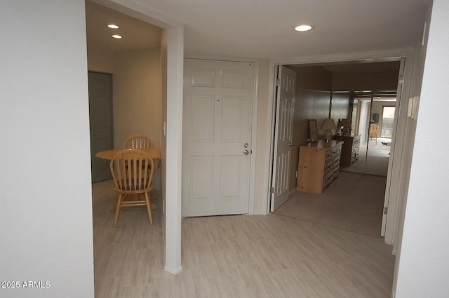 hallway featuring recessed lighting