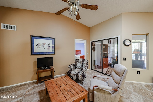 living room featuring lofted ceiling and ceiling fan