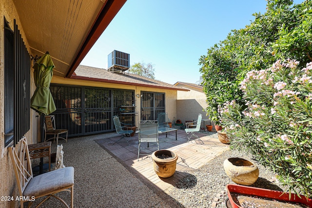 view of patio featuring cooling unit