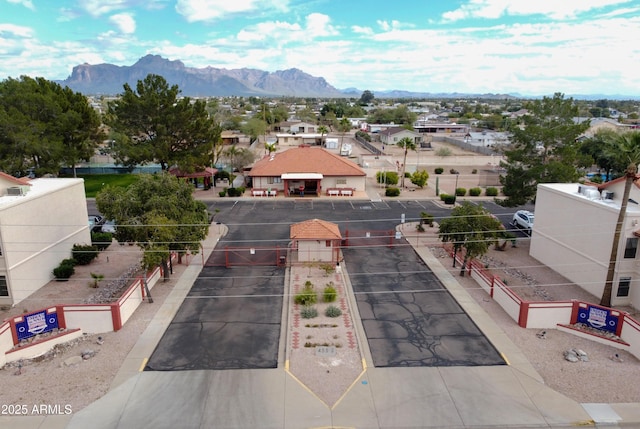 birds eye view of property featuring a mountain view