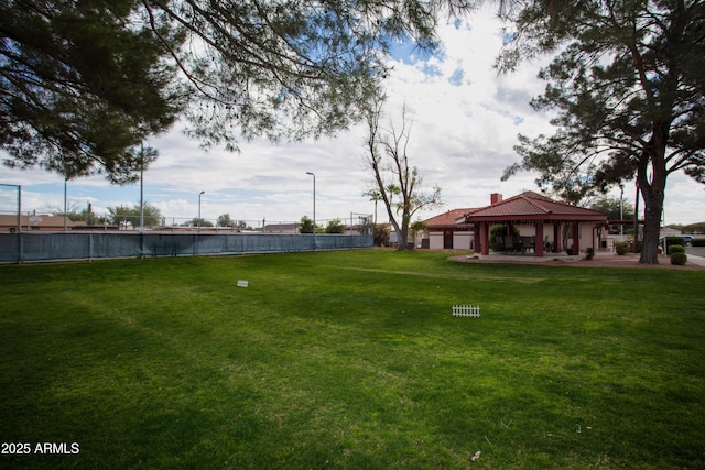 view of yard featuring a gazebo and fence