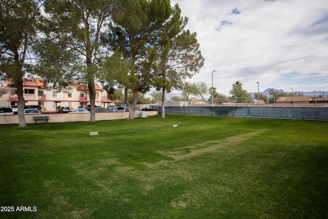 view of yard with fence