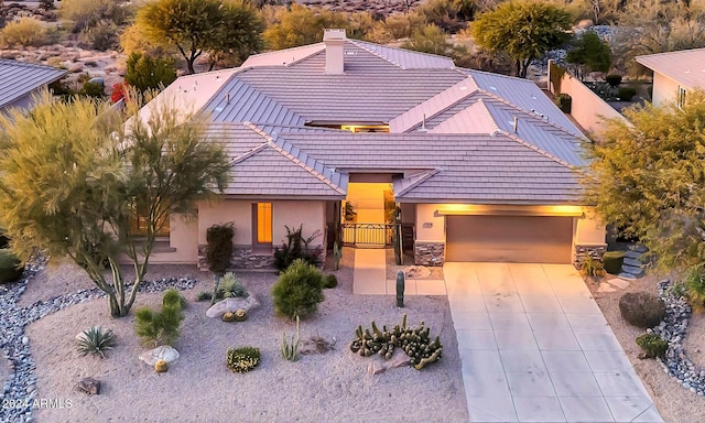 view of front of home with a garage