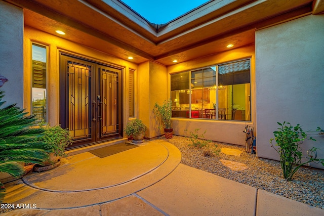 entrance to property featuring french doors