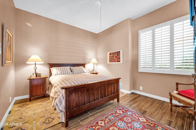 bedroom featuring hardwood / wood-style floors