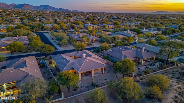 aerial view at dusk with a mountain view