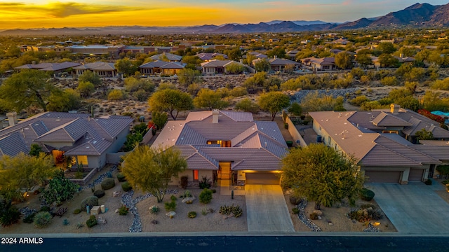 aerial view at dusk with a mountain view