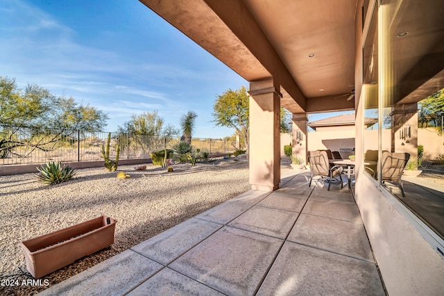 view of patio / terrace featuring ceiling fan