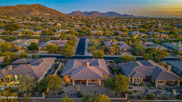 aerial view at dusk with a mountain view