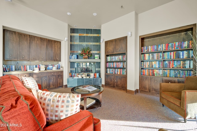 living room featuring light carpet