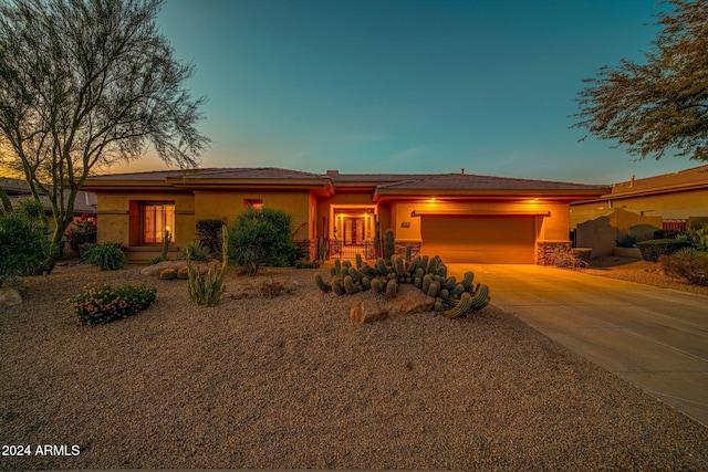 view of front of property featuring a garage